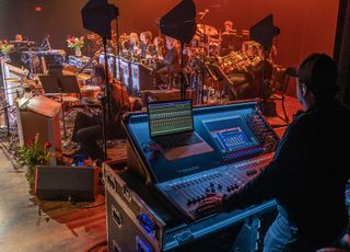 A sound engineer mixes a show using DiGiCo solutions.