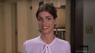 Amanda Peet as Judith smiling in Saving Silverman