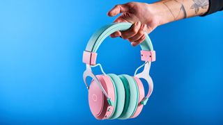 A pink and teal Cooler Master CH351 wireless gaming headset