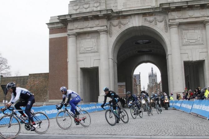 The peloton passes through the Menin Gate in Ypres