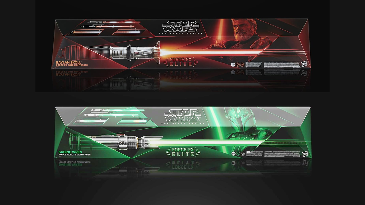 A pair of Force FX lightsabers in box, one green, one red.