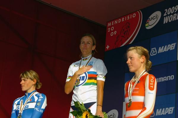 Newly crowned time trial world champion Kristin Armstrong (USA) listens to her national anthem.