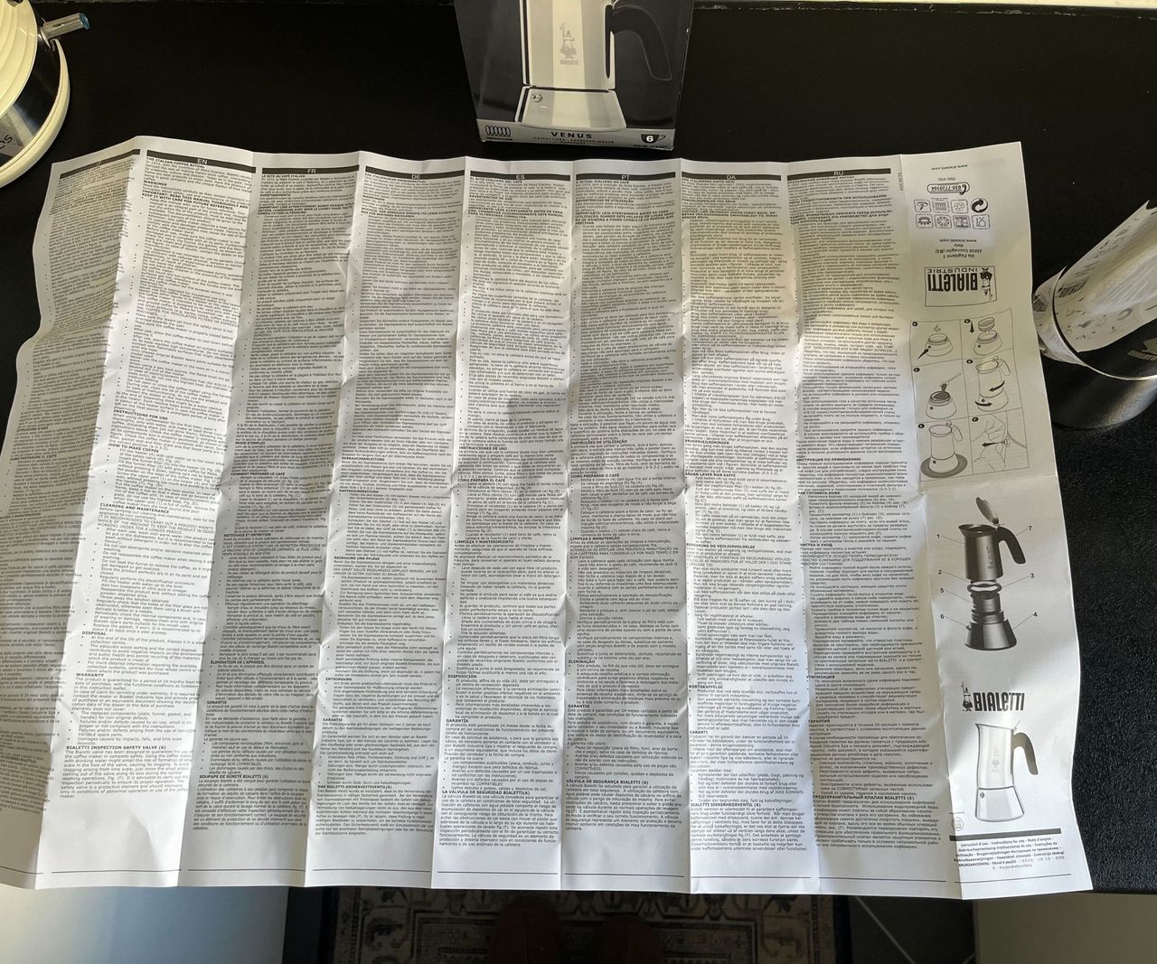 The huge Bialetti Venus instruction pamphlet on a kitchen counter