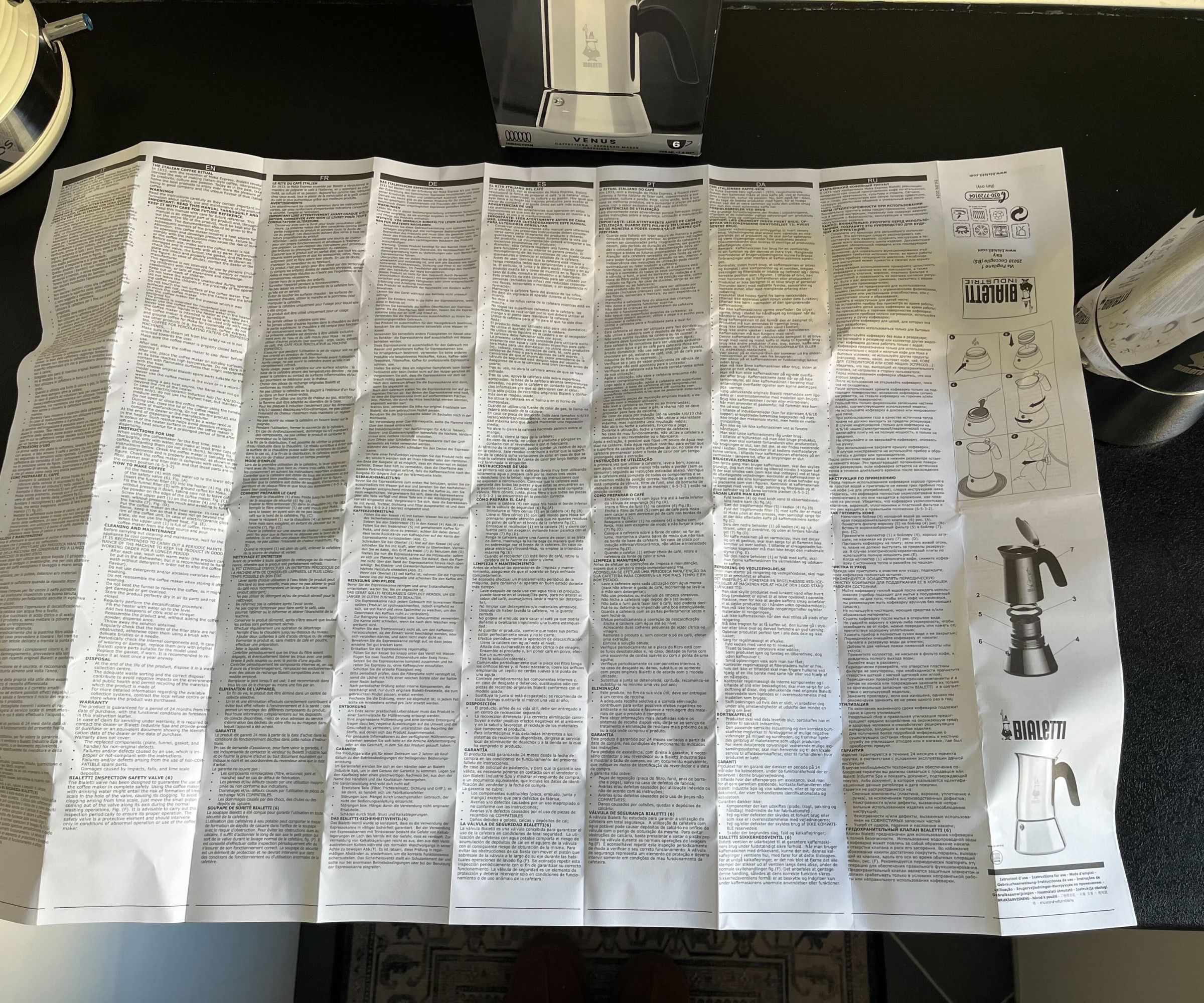 The huge Bialetti Venus instruction pamphlet on a kitchen counter