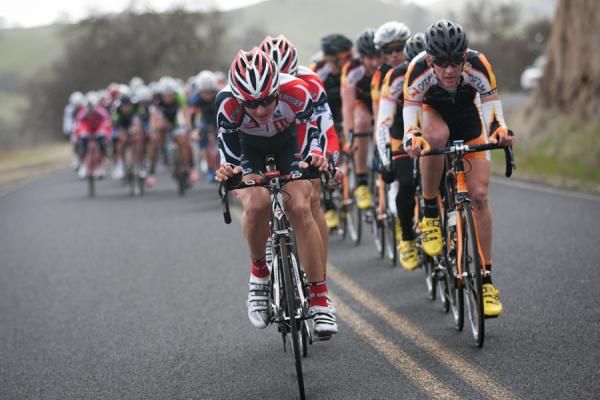 The field was together in the rainy closing kilometers, with Optum and Bissell teams leading the charge.