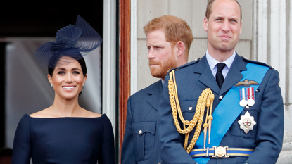Meghan, Duchess of Sussex, Prince Harry, Duke of Sussex and Prince William, Duke of Cambridge watch a flypast to mark the centenary of the Royal Air Force from the balcony of Buckingham Palace on July 10, 2018 in London, England. The 100th birthday of the RAF, which was founded on on 1 April 1918, was marked with a centenary parade with the presentation of a new Queen's Colour and flypast of 100 aircraft over Buckingham Palace.