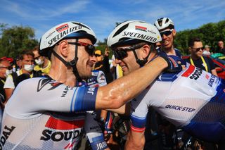 BOURGENBRESSE FRANCE JULY 20 Stage winner Kasper Asgreen of Denmark and Team Soudal Quick Step R celebrates the victory with his teammate Dries Devenyns of Belgium L after the stage eighteen of the 110th Tour de France 2023 a 1849km stage from Motiers to BourgenBresse UCIWT on July 20 2023 in BourgenBresse France Photo by Martin Divisek PoolGetty Images