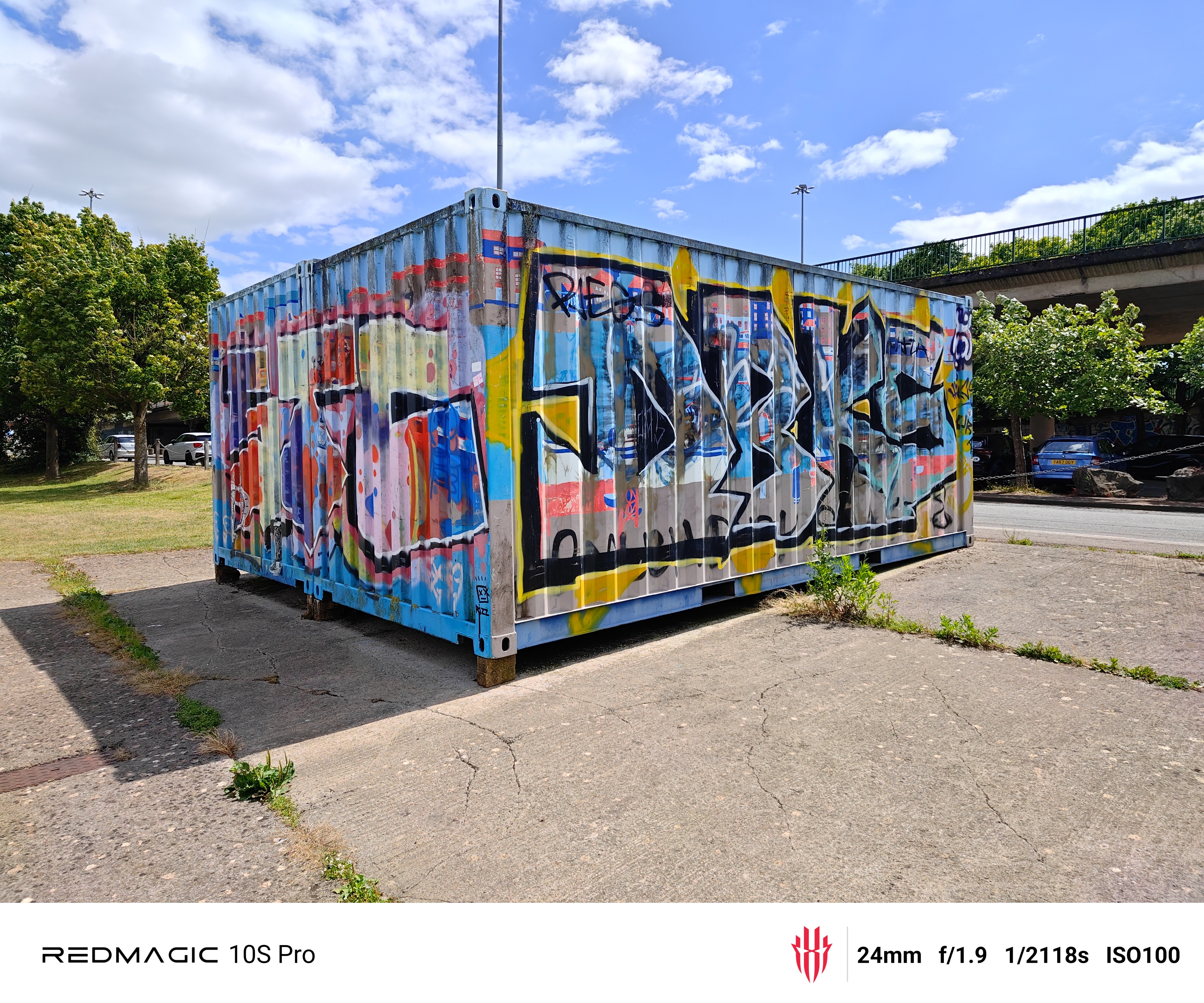 Image of graffiti covered shipping container shot on RedMagic 10S Pro with wide lens
