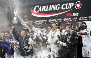 Tottenham players celebrate their League Cup final win over Chelsea in February 2008.