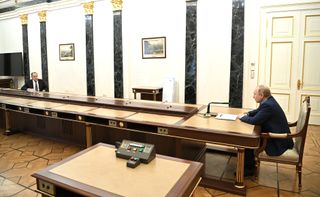 Vladimir Putin and Sergey Lavrov during their stage-managed meeting