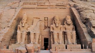 Here we see the entrance to at ancient Egyptian temple at Abu Simbel. There are four giant seated pharaohs, two on either side of the entrance.