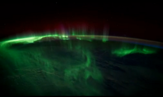 The southern lights dance over the Indian Ocean.