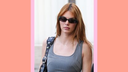 Kendall Jenner's red hair: Kendall Jenner with red hair, wearing sunglasses as she's photographed on on March 16, 2022 in Los Angeles, California. / in an orange and pink template