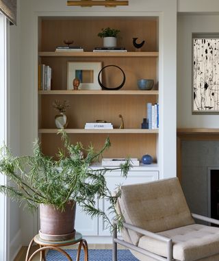 neutral living room with styled shelving