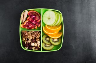 Portions of fruit in a container
