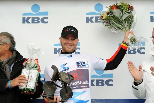 S&eacute;bastien Rosseler (RadioShack) with the winner's trophy and bouquet.