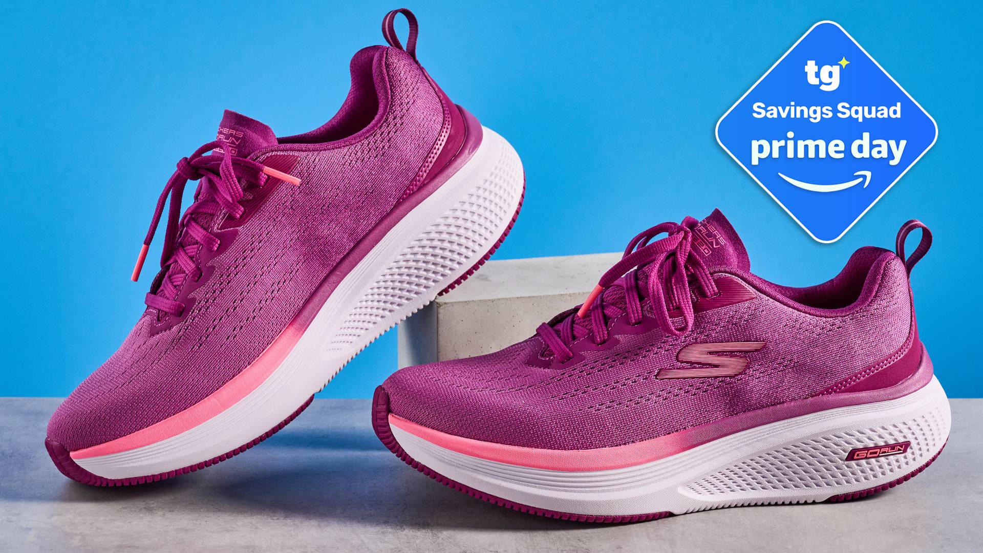 the skechers go run elevate 2.0 running shoes in the women's style, in fuchsia pink, photographed against a blue background