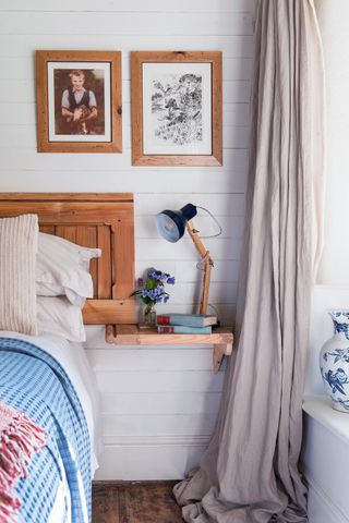small bedroom with floating bedside shelf