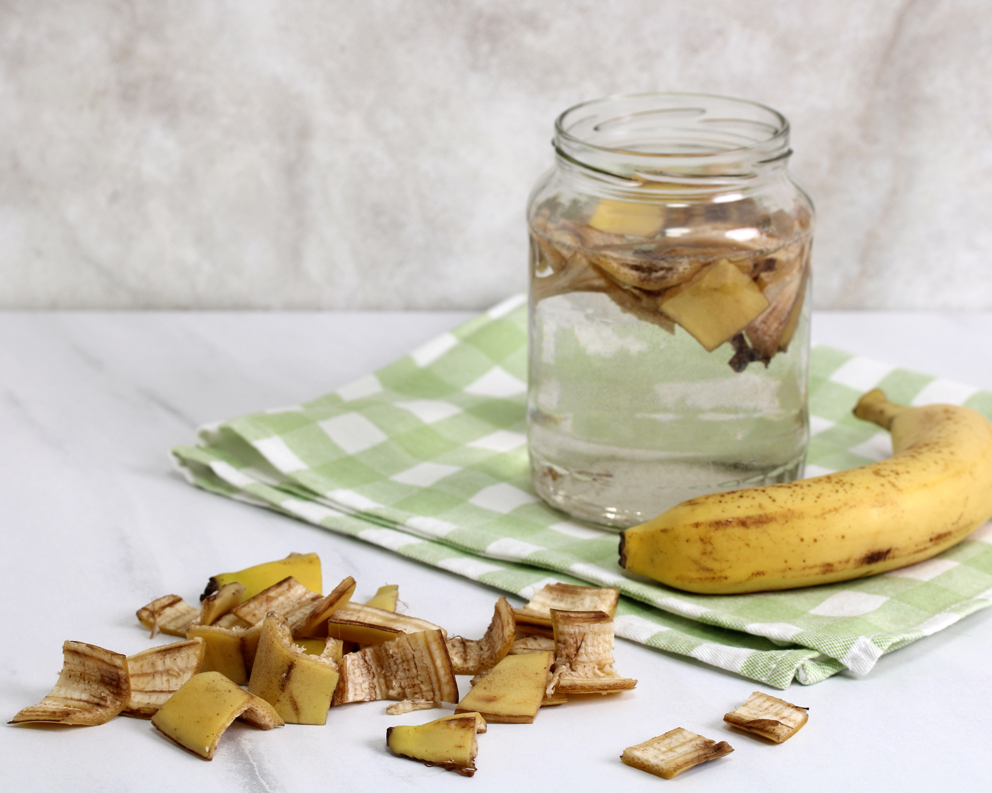 banana peel tea being prepared as a plant feed or tonic