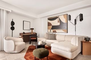 The living room area at one of The Jay rooms are minimal looking but have colour accents