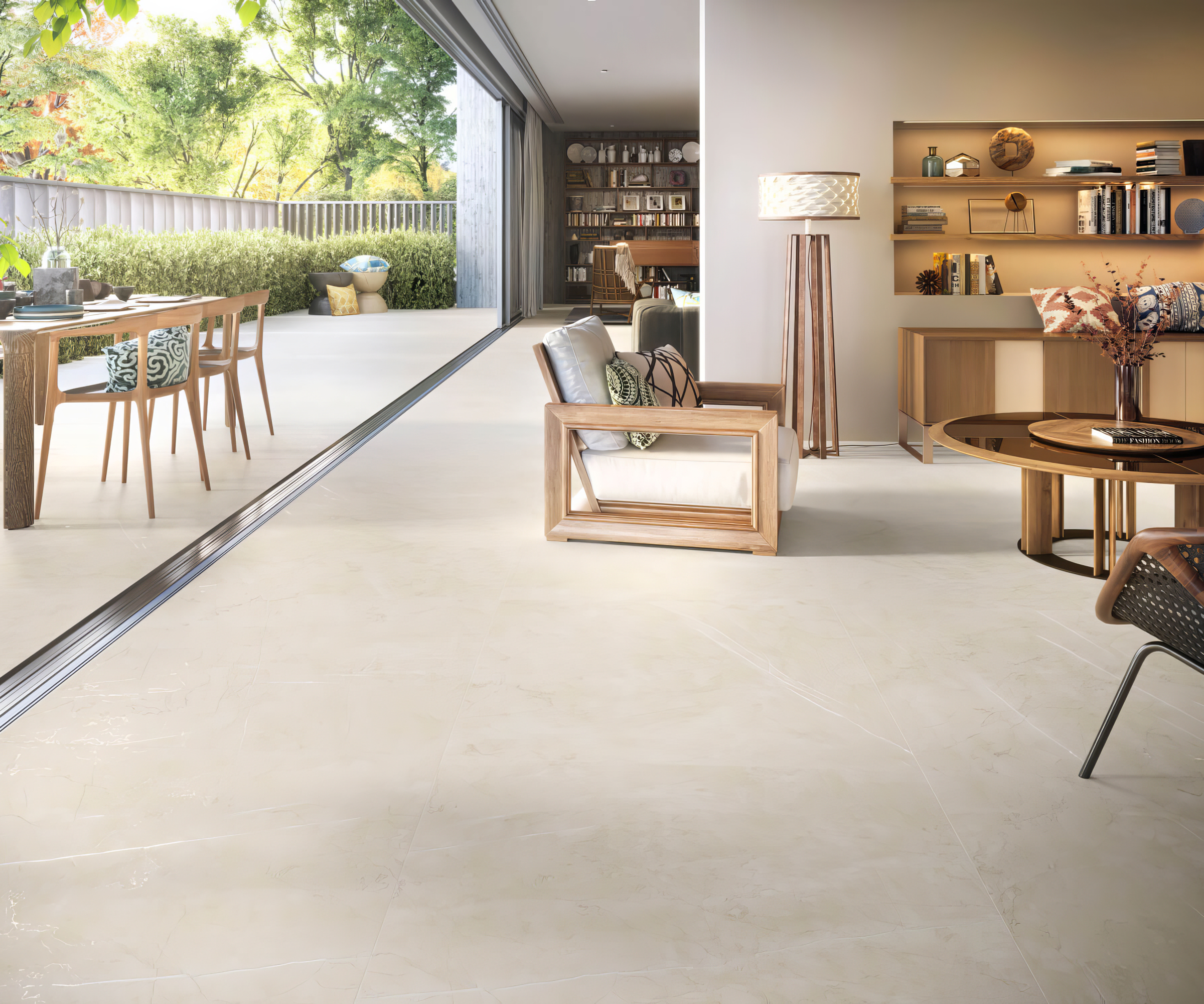 open plan living room with large cream floor tiles extending outdoors past large sliding doors