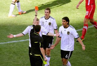 Germany's Miroslav Klose (11) is sent off against Serbia at the 2010 World Cup.