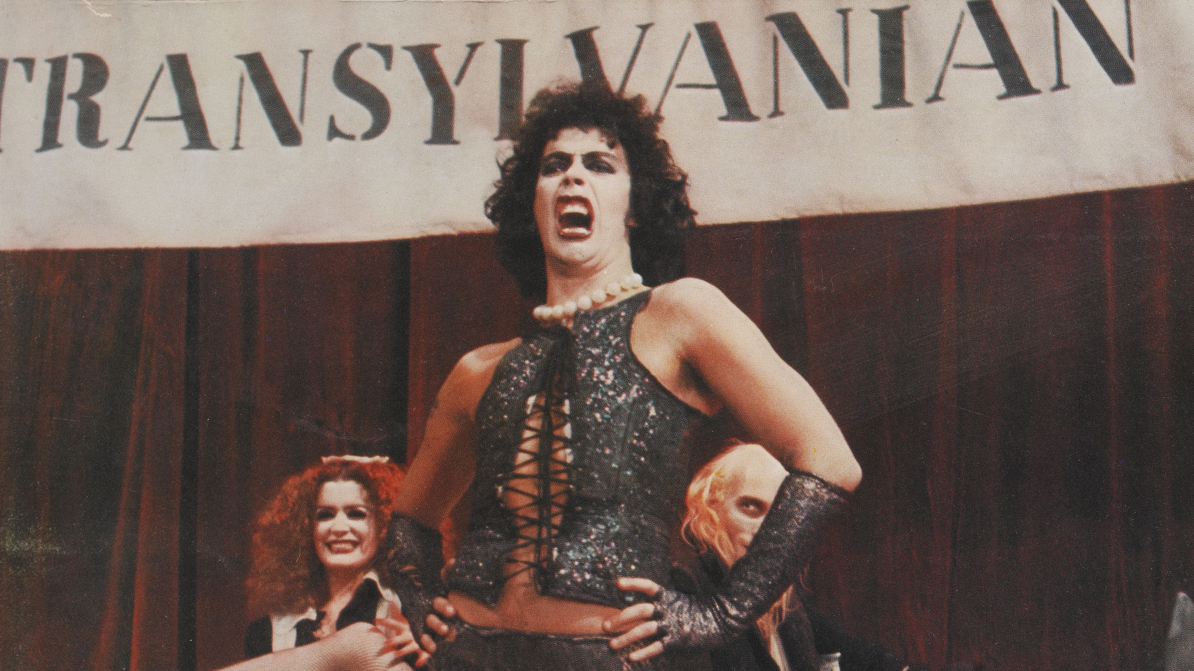 From right to left, actors Richard O'Brien, Tim Curry and Patricia Quinn as Riff Raff, Dr Frank-N-Furter and Magenta respectively, on a lobby card from the 1975 musical comedy 'The Rocky Horror Picture Show', produced by 20th Century Fox. (Photo by Movie Poster Image Art/Getty Images)