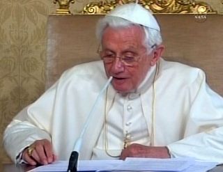 Pope Benedict XVI reads from a statement during the first papal call to space on May 21, 2011. The Pope spoke with 12 astronauts, including two Italians, on the International Space Station during NASA's STS-134 mission to the space station.