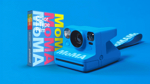 Polaroid Now Instant Camera Generation 3 - MoMa Edition camera against a blue background