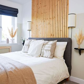 bedroom with wooden wall panelling