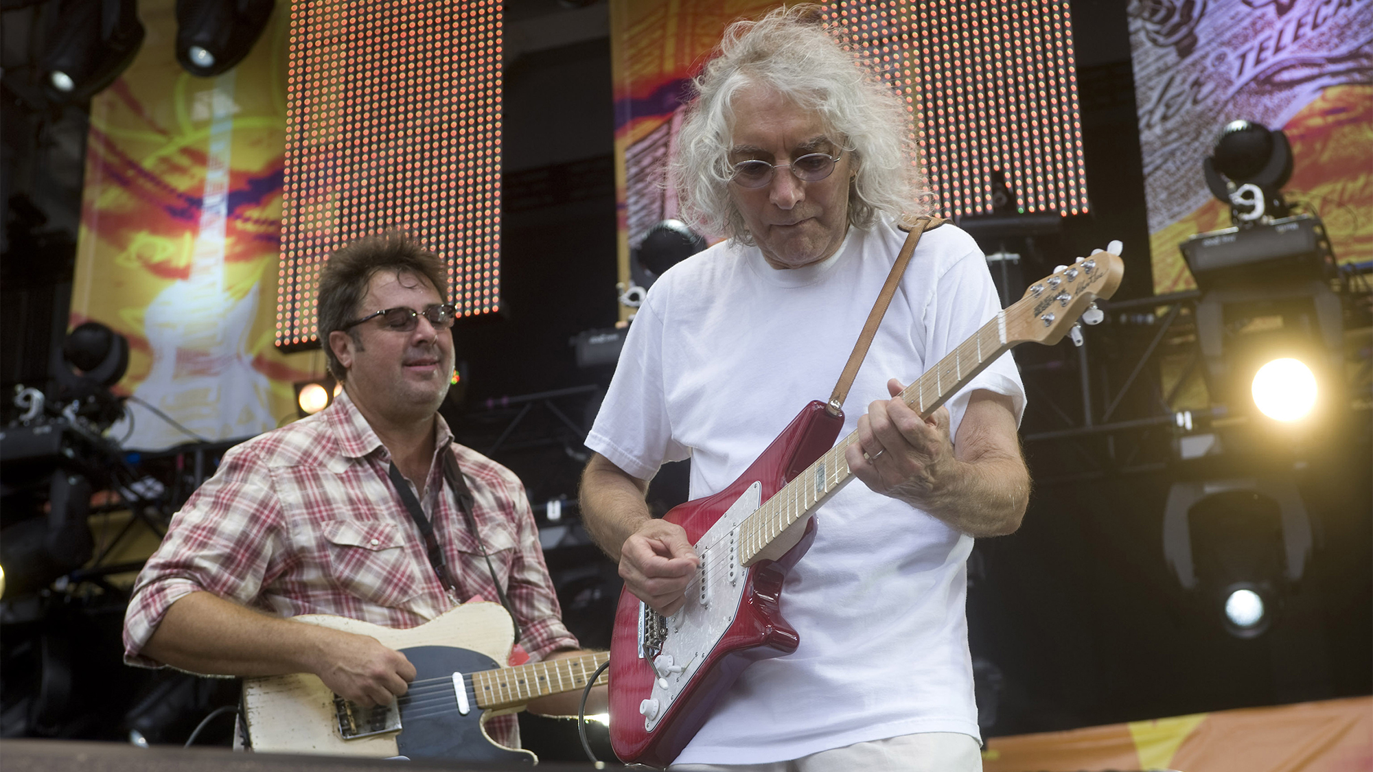 Musicians Vince Gill (left) and Albert Lee perform onstage at Eric Clapton's Crossroads Guitar Festival, held at Toyota Park, Bridgeview, Illinois, June 26, 2010.