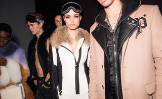 Models wearing faux fur jacket