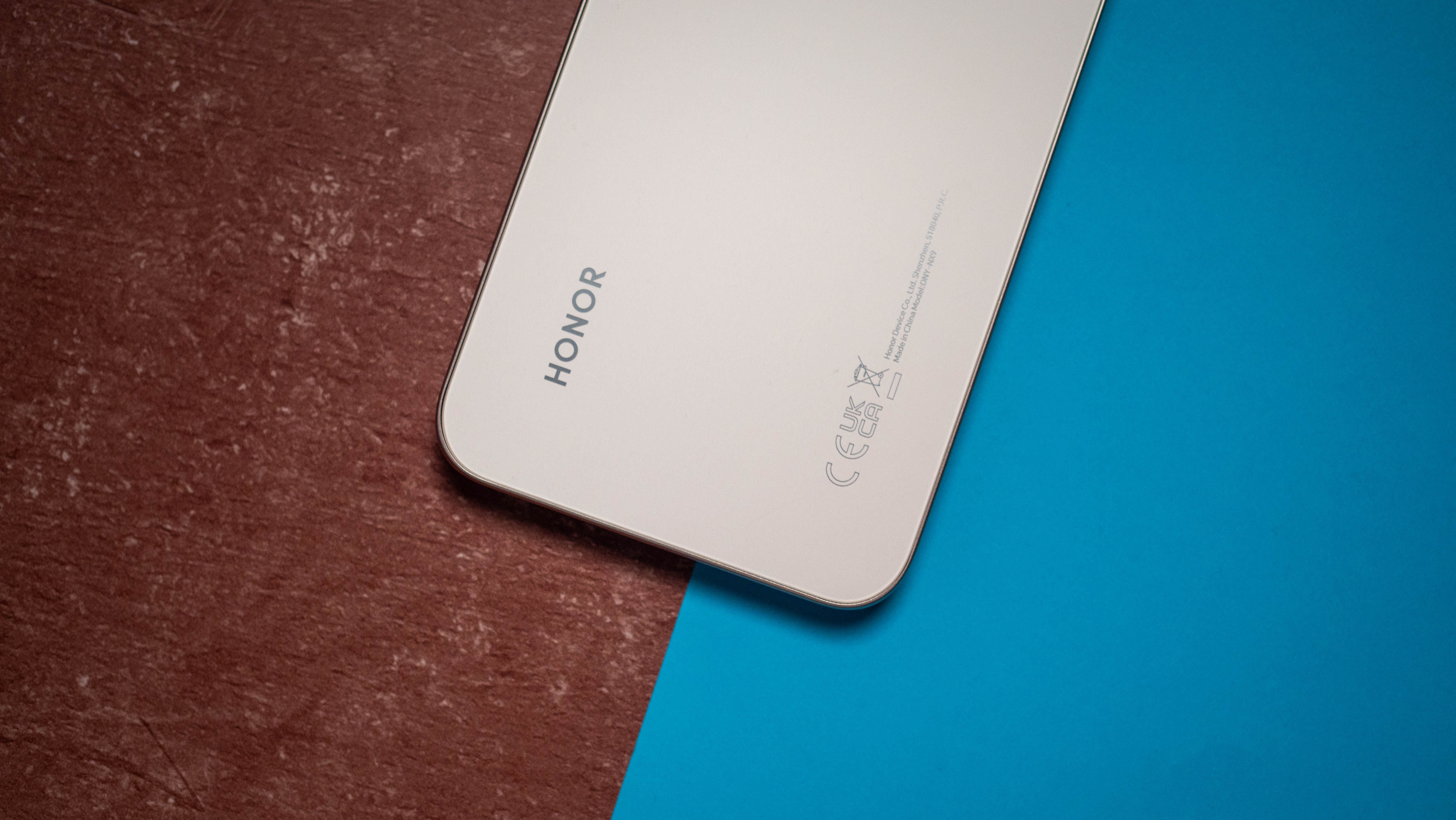 Honor 400 back view against blue and red background with Honor logo highlighted