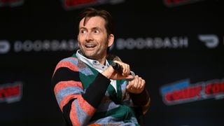 David Tennant on-stage during a talk at New York Comic Con 2023