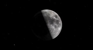 a half-shaded moon hangs large in the sky.