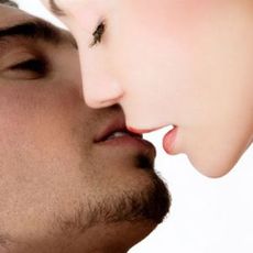 girl and guy kissing