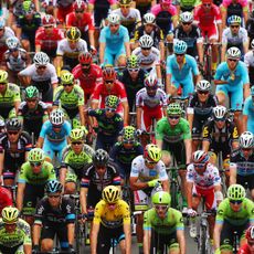 Helmet, Sportswear, Sports gear, Endurance sports, Personal protective equipment, Red, Team, Competition event, Bicycles--Equipment and supplies, Bicycle jersey, 