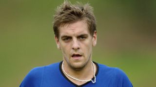 KUALA LUMPUR, MALAYSIA - JULY 21: Jonathan Woodgate of Newcastle United jogs during a light work out at a training session held at the National Sports Council ground in Kuala Lumpur, Malaysia ahead of the FAPL/Asia Cup to be held at the Bukit Jalil National Stadium from July 24, 2003 to July 27, 2003. (Photo by Stanley Chou/Getty Images)