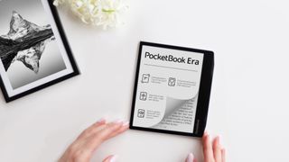 Fingers touching the PocketBook Era