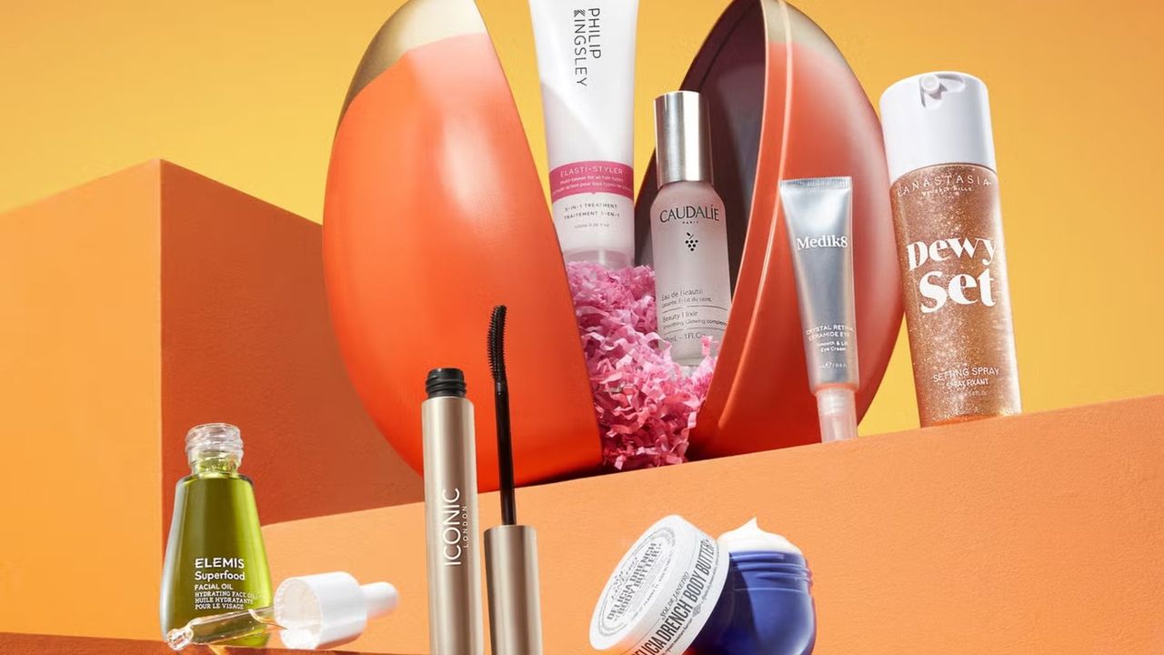 products lined up around the lookfantastic beauty egg, including elemis, medik8, so de janeiro, caudalie, philip kingsley, iconic, anastasia beverley hills