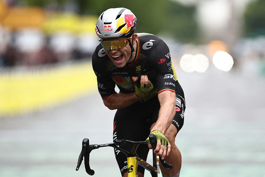 Team Visma - Lease a bike team's Belgian rider Wout van Aert cycles to the finish line to win the 21st and final stage of the 112th edition of the Tour de France cycling race, 132.3 km between Mantes-la-Ville and Paris Champs-Ã‰lysees, on July 27, 2025. (Photo by Anne-Christine POUJOULAT / AFP)