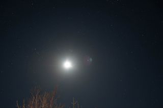 Astrophotograph taken with the Nikon D7500 showing the full moon in the night sky