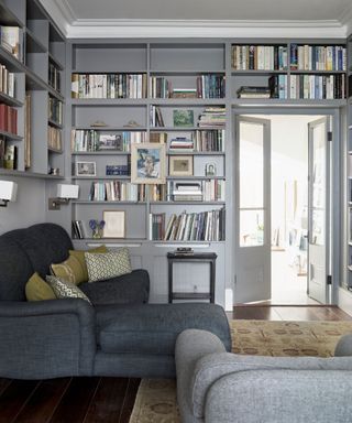 Library with books and grey shelving