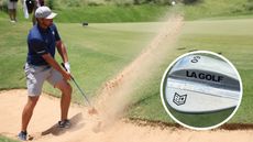 Bryson DeChambeau hits a bunker shot and an LA Golf wedge in the corner