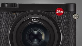 The Leica Q2 camera on a grey background