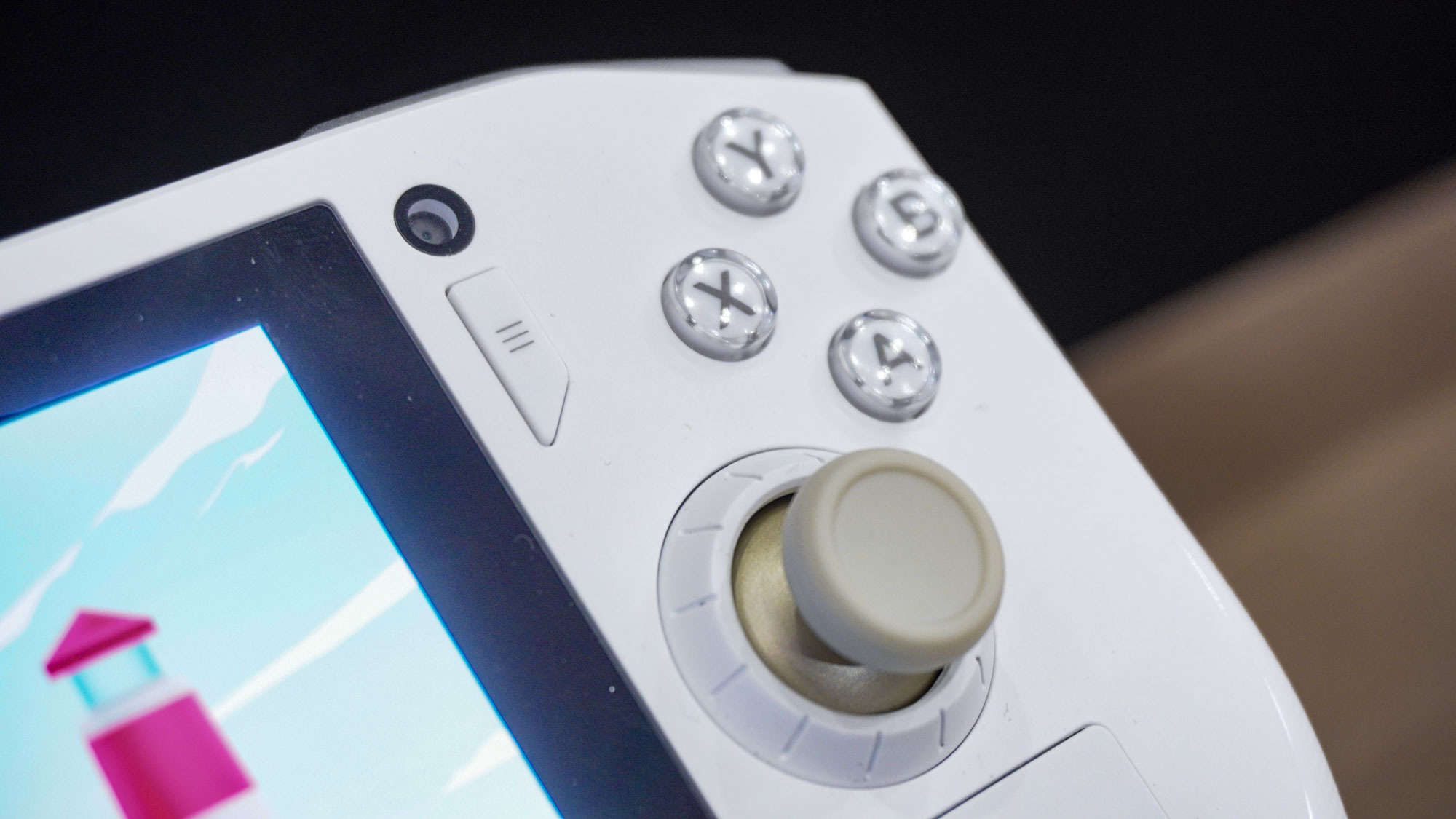 The front-facing camera, face buttons and right thumbstick on the new Zotac Zone