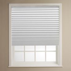white window with shutter cream wall