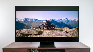 TCL QM7 Mini-LED TV on table in living room