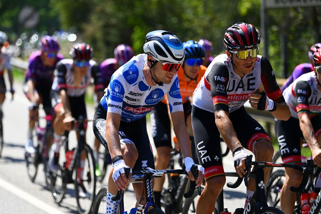 LES PRAERESNAVA SPAIN AUGUST 28 LR Jay Vine of Australia and Team AlpecinDeceuninck Polka dot mountain jersey and Marc Soler Gimenez of Spain and UAE Team Emirates compete during the 77th Tour of Spain 2022 Stage 9 a 1714km stage from Villaviciosa to Les Praeres Nava 743m LaVuelta22 WorldTour on August 28 2022 in Les Praeres Nava Spain Photo by Tim de WaeleGetty Images
