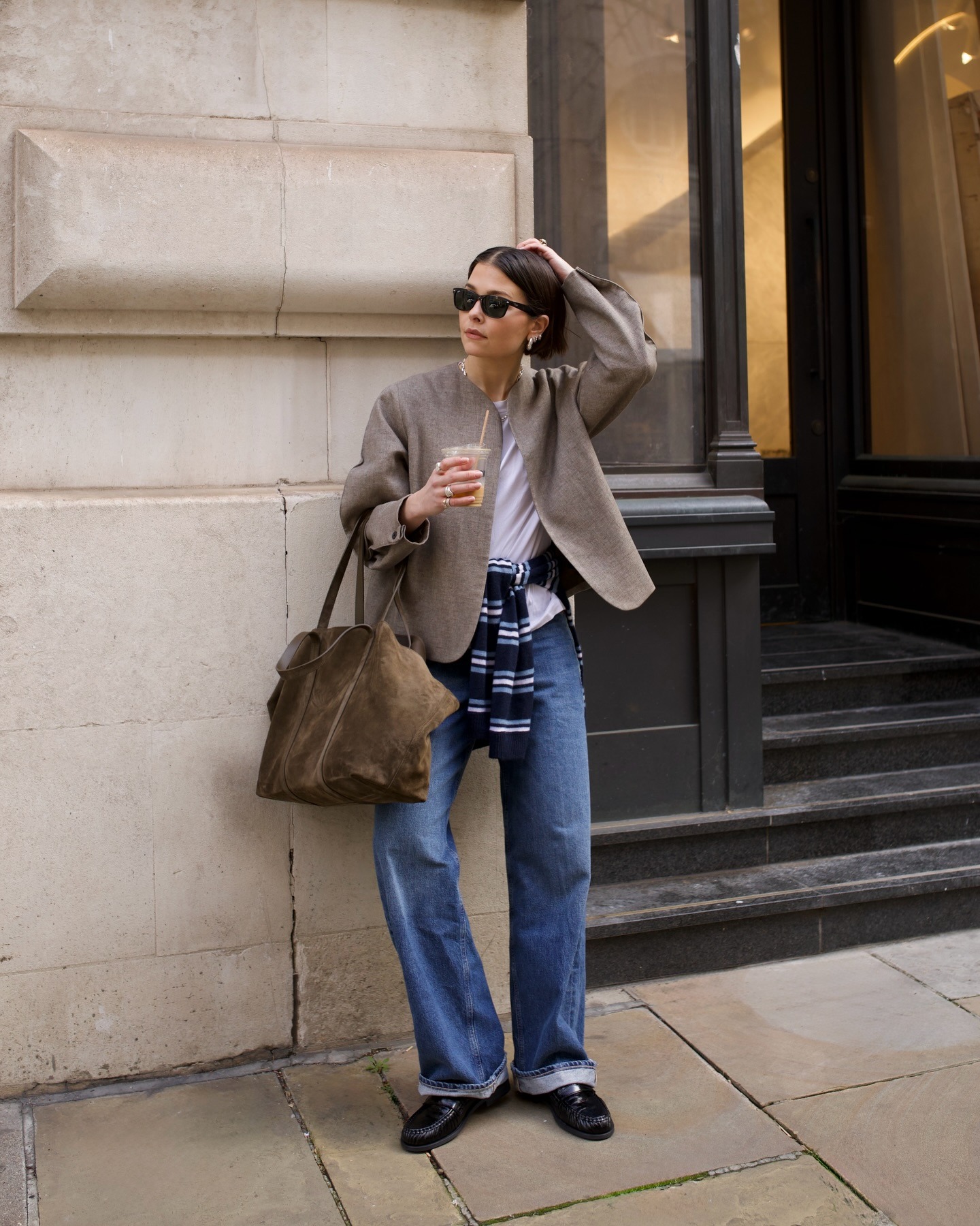 Woman wearing spring denim with spring shoe trend.